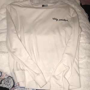 H&M “Stay Positive” long sleeve
